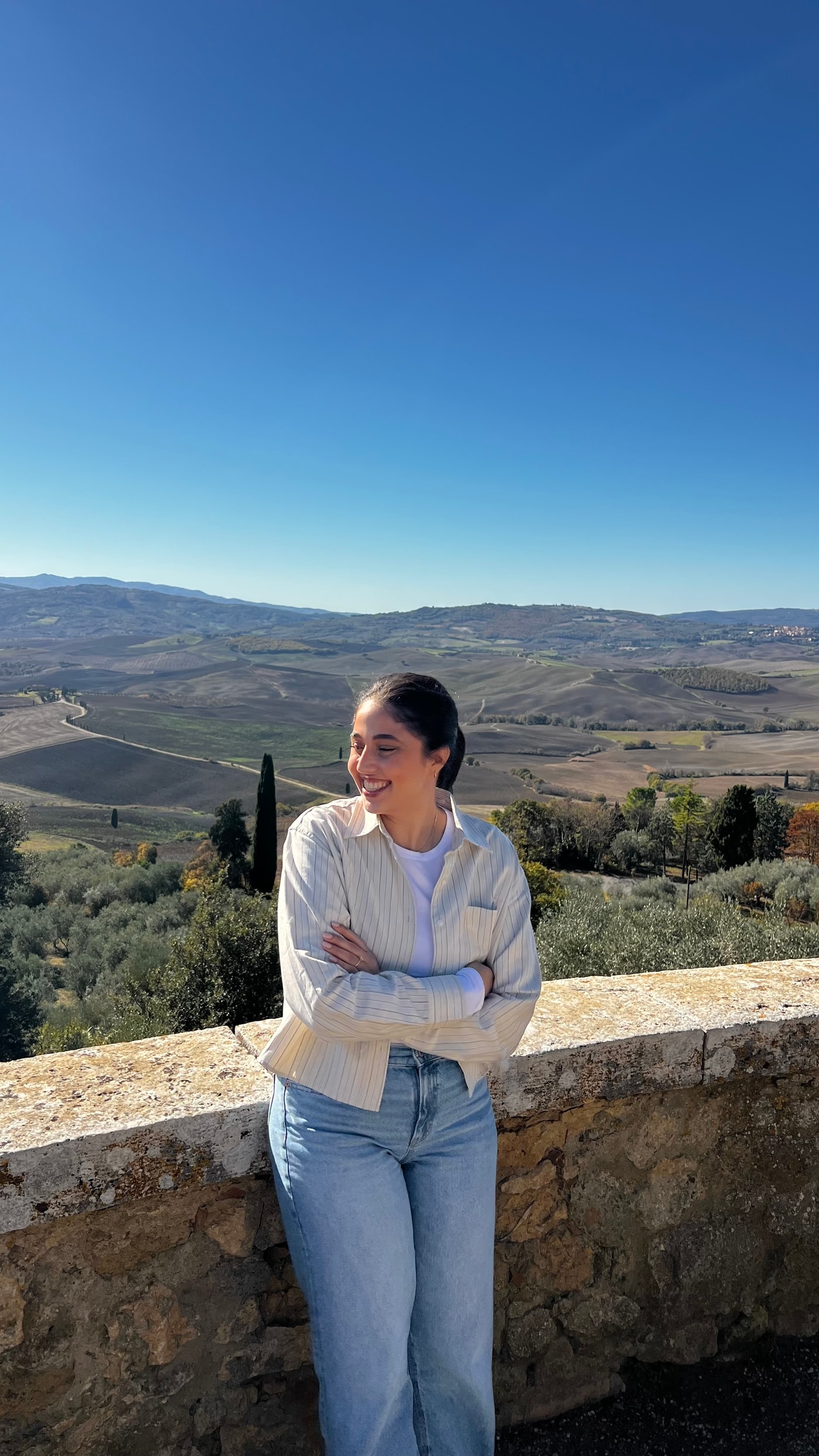 Noy Adani outdoors in the Tuscan countryside